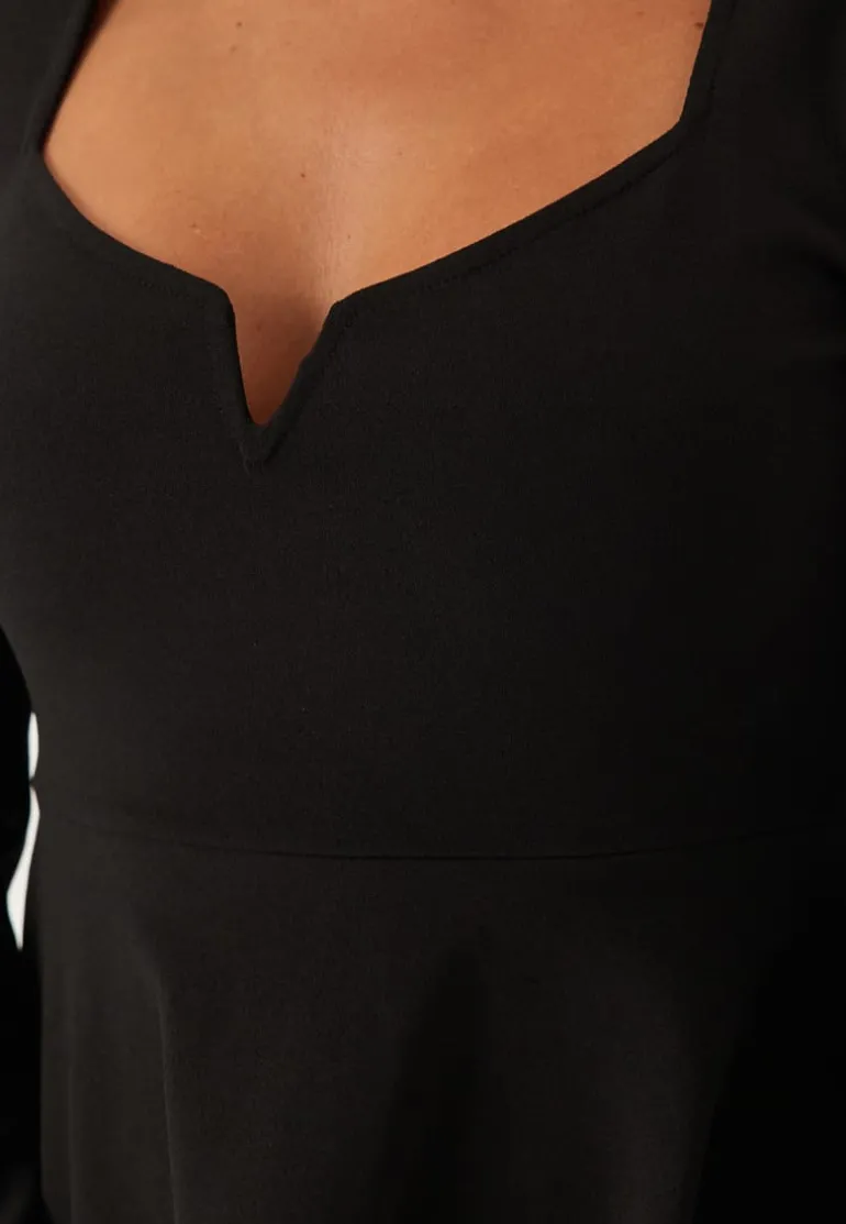Long Sleeve Peplum Top